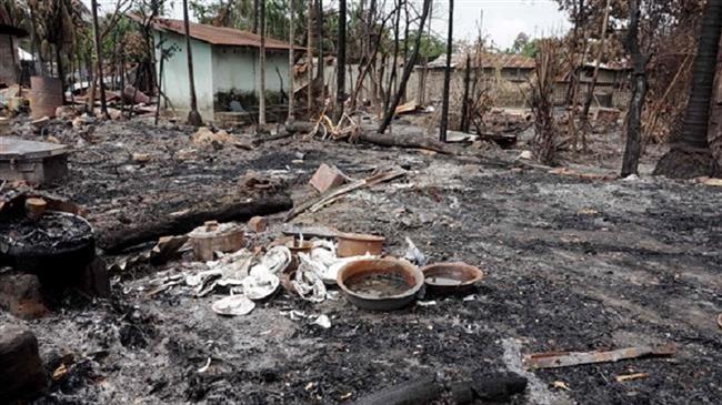 Broken dishes can be seen in the remains of a house burned down in the Myo Thu Gyi Muslim village in northern Rakhine State on August 31, 2017. (Photo by AFP)