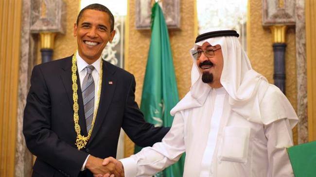 This file photo shows former US president Barack Obama (L) shaking hands with former Saudi King Abdullah bin Abdulaziz al-Saud on the outskirts of Riyadh, Saudi Arabia, on June 3, 2009. (By AFP)