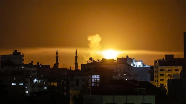 An explosion is seen in Gaza City after an airstrike by Israeli forces on June 2, 2018. (Photo by AFP)