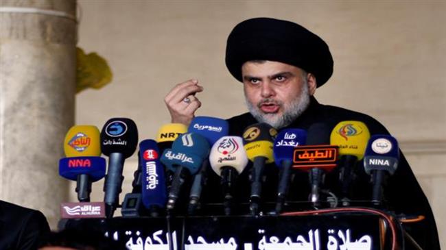 Iraqi cleric Moqtada al-Sadr delivers a speech during Friday prayer at the Great Mosque of Kufa, 10 kilometers (about 6 miles) northeast of the shrine city of Najaf in central Iraq on November 17, 2016. (Photo by AFP)