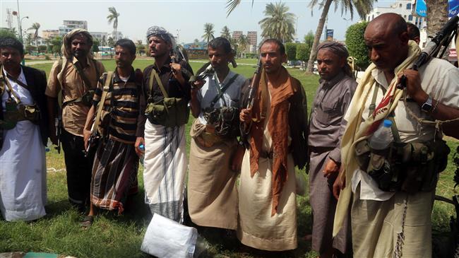 Houthi Ansarullah fighters are seen during a gathering to mobilize more forces to the battlefront to fight Saudi-led forces and militia, in the Red Sea port city of Hudaydah, Yemen, on June 18, 2018. (Photo by AFP)