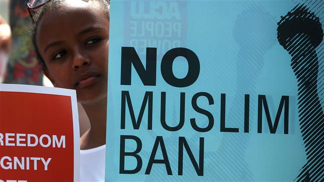 A woman participates in demonstration against US President Trump