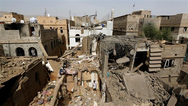 People check damage at the site of a Saudi airstrike in Amran, Yemen, on June 25, 2018. (Photo by Reuters)