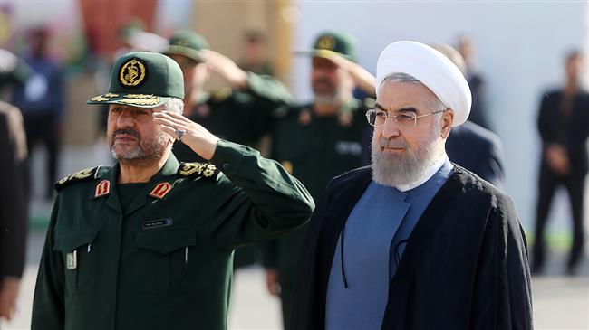 Iranian President Hassan Rouhani (R) and IRGC Commander Major General Mohammad Ali Jafari (file photo)