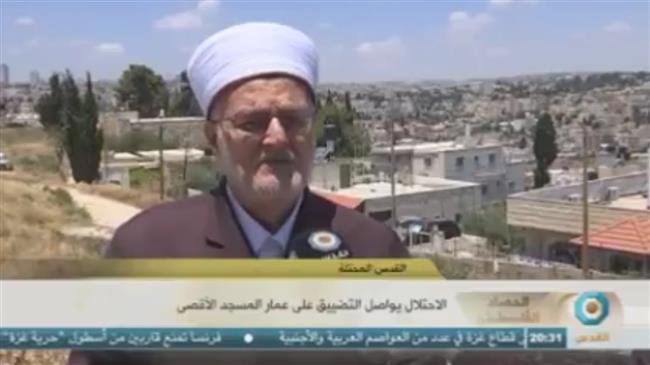 This picture shows a grab of a program broadcast on Arabic-language Palestinian al-Quds television network.