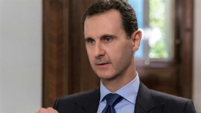 This handout picture released by SANA on June 24, 2018 shows Syrian President Bashar al-Assad giving a televised interview with the Russian NTV channel in the capital Damascus. (Photo via AFP)