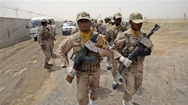 The undated photo shows a group of Iranian border guards.