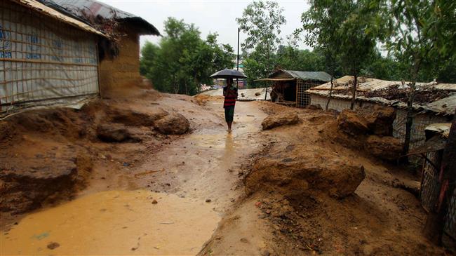 This handout photo, released by Save the Children on April 19, 2018, shows pools of water at a refugee camp for Rohingya refugees in Bangladesh. (Via AFP)