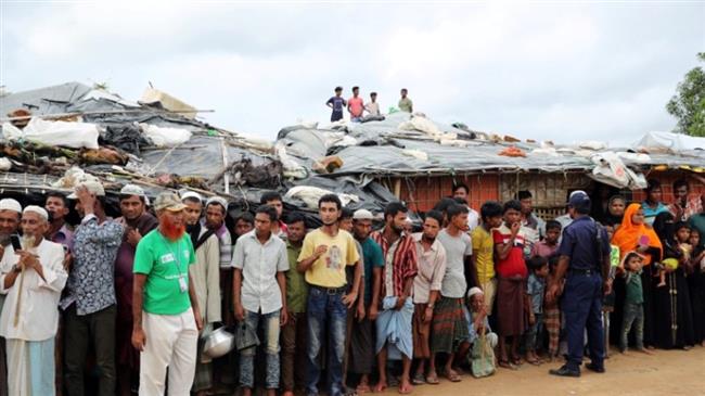 Rohingya refugees gather during the visit of UN Secretary General Antonio Guterres at the Kutupalong refugee camp in Cox’s Bazar, Bangladesh, July 2, 2018. (Photo by Reuters)