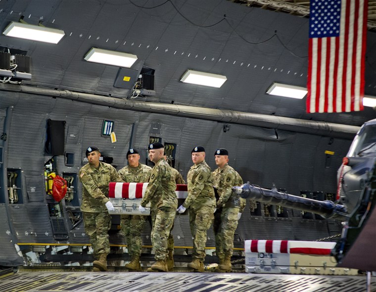 Members of the Old Guard carry the transfer case of U.S. Army Sgt.