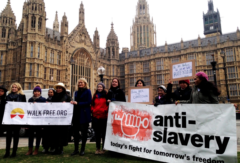 Protest outside the Houses of Parliament demanding to step up the fight against modern slavery in the UK