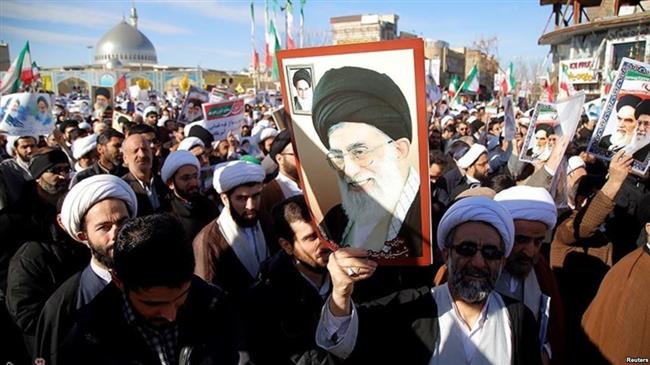 This file photo shows Iranians taking part in pro-government rallies on January 3, 2018, following sporadic riots in a number of cities initiated by protests at the country’s economic conditions.