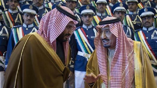 The undated photo shows Saudi King Salman bin Abdulaziz Al Saud, right, and his son Crown Prince Mohammed bin Salman.