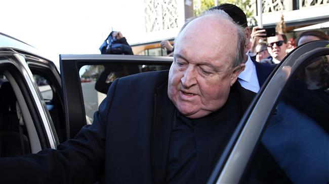 Former Australian archbishop Philip Wilson leaves a court in Newcastle, Australia, on August 14, 2018. (Photo by AFP)