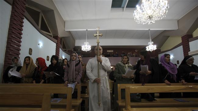 Iranian Christians attend Christmas rituals at the Saint Mary Chaldean- Assyrian Catholic church, in downtown Tehran, Iran. (Photo by AP)