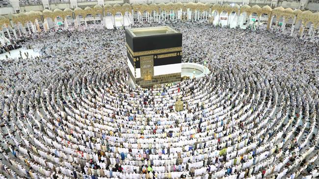 Muslim worshippers perform prayers around the Kaaba at the Grand Mosque in the holy city of Mecca in Saudi Arabia, August 15, 2018. (Photo by AFP)