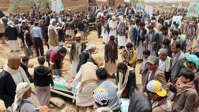 Yemenis take part in a mass funeral on August 13, 2018 in the northern Yemeni city of Sa’ada for children killed in an airstrike by the Saudi-led coalition last week. (Photo by AFP)