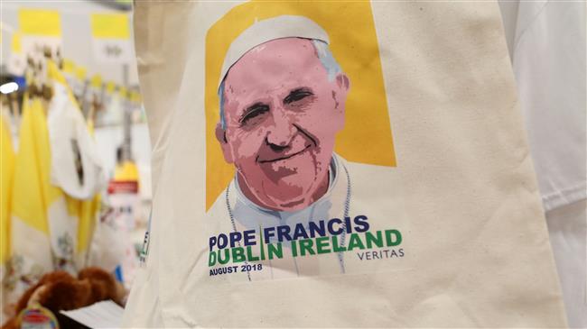 Merchandise with the face of Pope Francis is on sale at the World Meeting of Families in Dublin on August 23, 2018. (Photo by AFP)