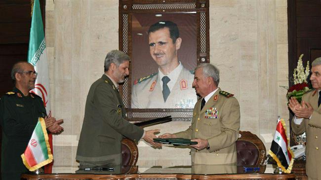 Iranian Defense Minister Brigadier General Amir Hatami (2nd L) meets with his Syrian counterpart General Ali Abdullah Ayyoub (2nd R) in the Syrian capital Damascus, August 26, 2018. (Photo by SANA)