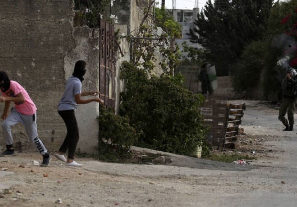Israeli Soldiers Clash with Palestinian Protesters in West Bank City of Nablus