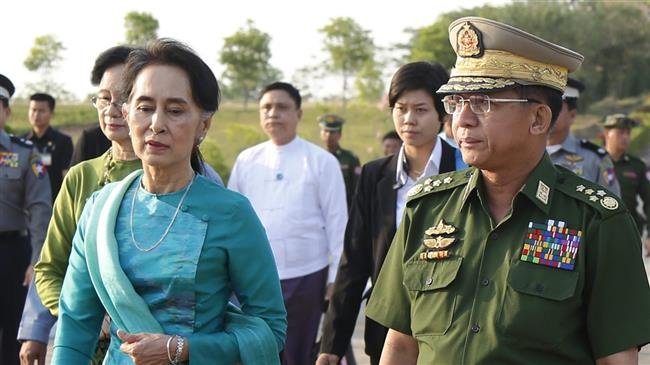 Myanmar’s military chief Min Aung Hlaing is seen alongside the country’s de facto leader Aung San Suu Kyi in this file photo.