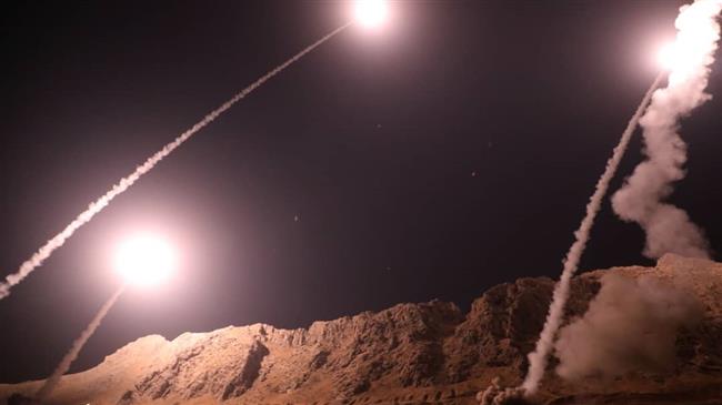 This October 1, 2018 photo by the IRGC shows missiles fired by the force at terrorist positions in Syria in retaliation against a recent terrorist attack that killed dozens of people in the city of Ahvaz, southwestern Iran.