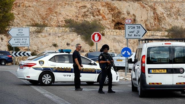 Israeli forces gather at the site of a reported attack at the Barkan Industrial Park near the Israeli settlement of Ariel in the occupied West Bank, October 7, 2018. (Photo by AFP)