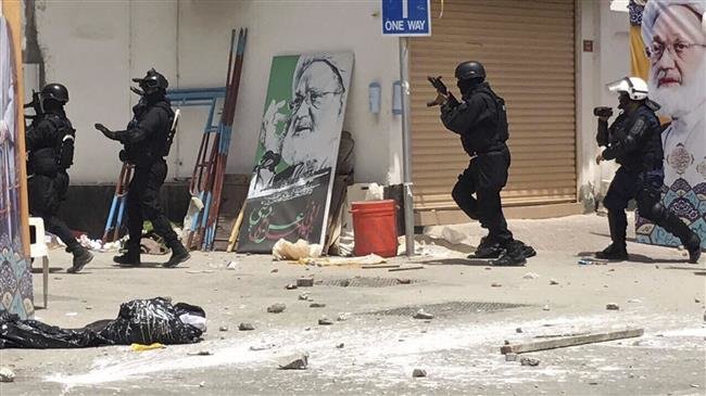 The image provided by an unnamed activist shows Bahraini security forces during a raid on a sit-in, in Diraz, Bahrain, May 23, 2017. (Via AP)