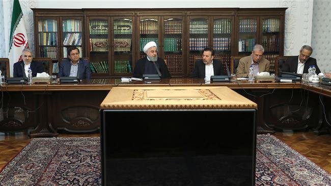 Iranian President Hassan Rouhani (3rd L) addresses a meeting with a group of economic experts and academics in Tehran on October 15, 2018. (Photo by president.ir)