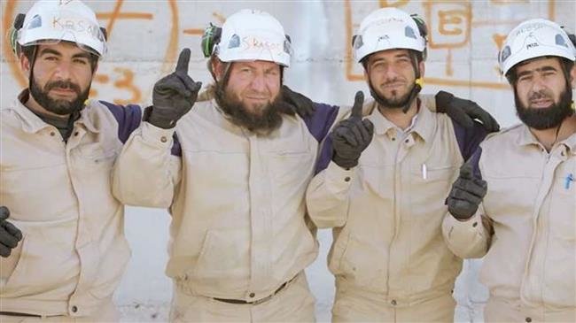 The undated photo shows members of the Western-backed so-called White Helmets "aid" group.