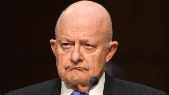 This file photo taken on May 08, 2017 shows former Director of National Intelligence James Clapper preparing to testify before the US Senate Judiciary Committee on Capitol Hill in Washington, DC. (Photo by AFP)