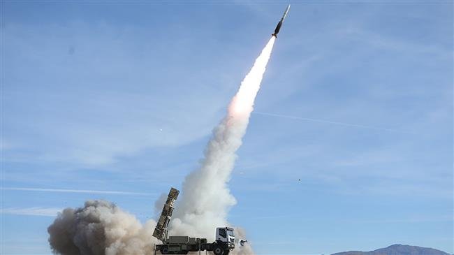 A handout picture made available by the Iranian Army office shows Sayyad missile fired from Talash missile system during an air defense drill in an undisclosed location in Iran, 05 November 2018 . (Photo by AFP)