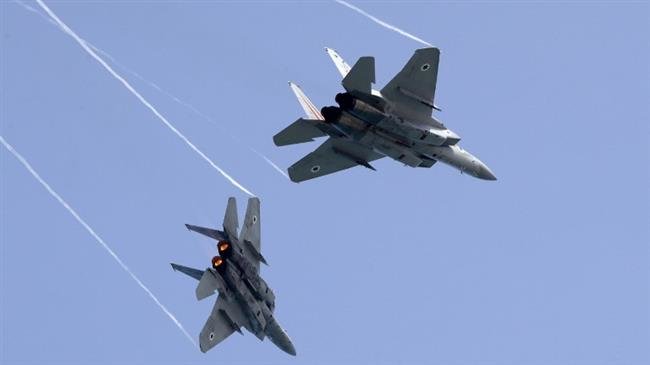 In this file photo taken on April 12, 2018, Israeli F-15 warplanes perform a rehearsal ahead of an airshow in Tel Aviv. (Photo by AFP)