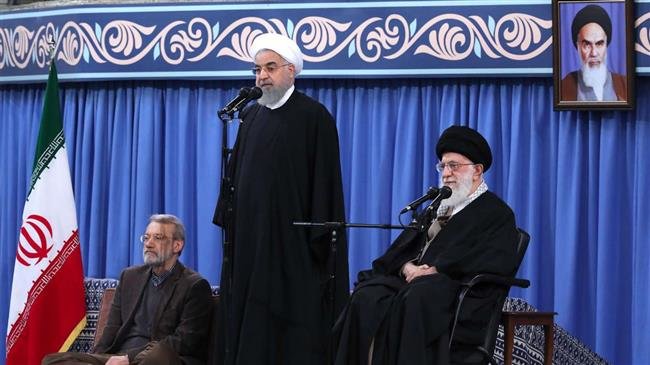 Iran’s President Hassan Rouhani, standing, delivers an address during a meeting between Leader of the Islamic Revolution Ayatollah Seyyed Ali Khamenei and participants of an international Islamic unity conference in Tehran, November 25, 2018. (Photo by IRNA)