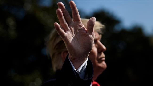 US President Donald Trump speaks to reporters before walking to Marine One on the South Lawn of the White House on November 29, 2018 in Washington, DC. (AFP photo)