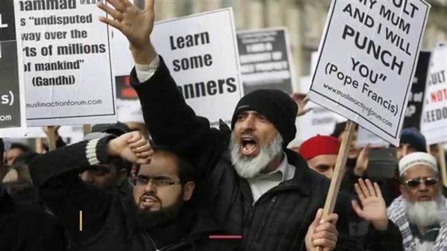 File photo shows Muslims during a demonstration in the British capital of London.