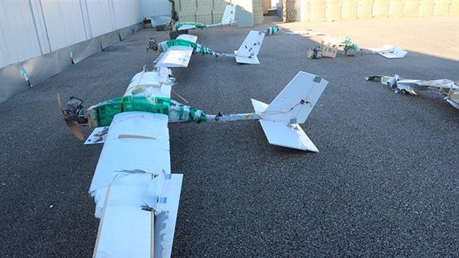 This file picture shows drones shot down by Russian forces over the Hmeimim air base in Latakia, western Syria. (Photo by the Russian Ministry of Defense)