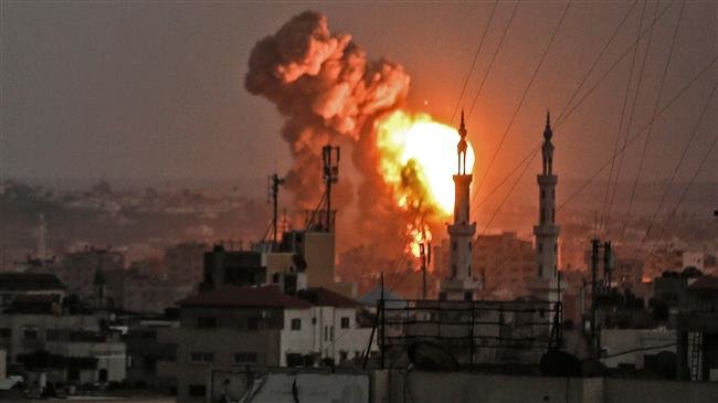 A picture taken on July 20, 2018 shows a fireball exploding in Gaza City during Israeli bombardment of the area. (Photo by AFP)