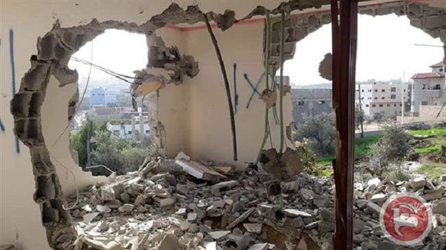 The photo, taken on December 16, 2018, shows the aftermath of demolition of Palestinian Ashraf Na’alwa’s family home by Israeli forces in the Shweika village, in the northern occupied West Bank district of Tulkarem. (Photos by Ma’an)