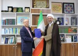 حجت الاسلام والمسلمین شریفی به عنوان رئیس دانشگاه قم منصوب شد