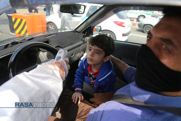 تست تب سنجی توسط جمعیت هلال احمر در خروجی تهران‎