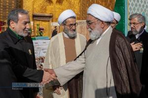 آیین تعویض پرچم گنبد منور رضوی در روز میلاد امام رئوف (ع)