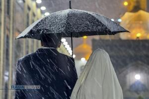 بارش باران و برف در حرم مطهر رضوی