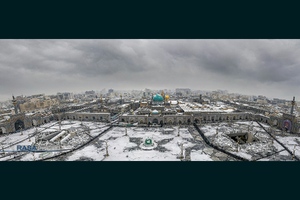بارش باران و برف در حرم مطهر رضوی