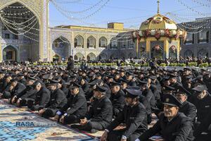 آیین تعویض پرچم گنبد منور رضوی در روز میلاد حضرت امام رضا (علیه‌السلام)