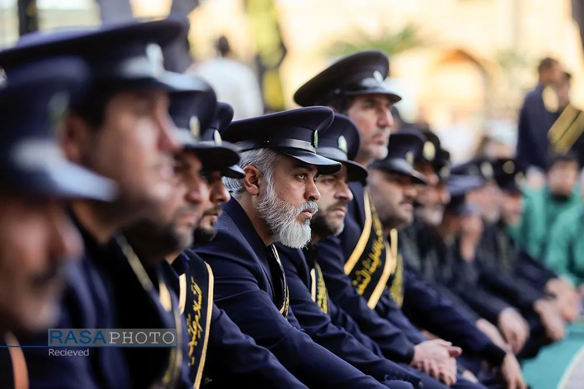 آیین تعویض پرچم گنبد مطهر حرم حضرت فاطمه معصومه (سلام&zwnj;الله&zwnj;علیها)