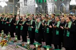 آیین تعویض پرچم گنبد منور رضوی در روز میلاد امام رضا(علیه&zwnj;السلام)