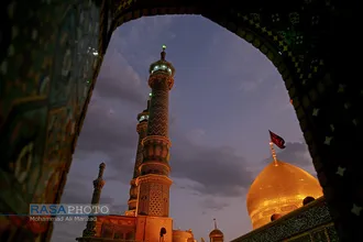 آیین تعویض پرچم گنبد حرم حضرت معصومه (سلام الله علیها) در شب اول محرم