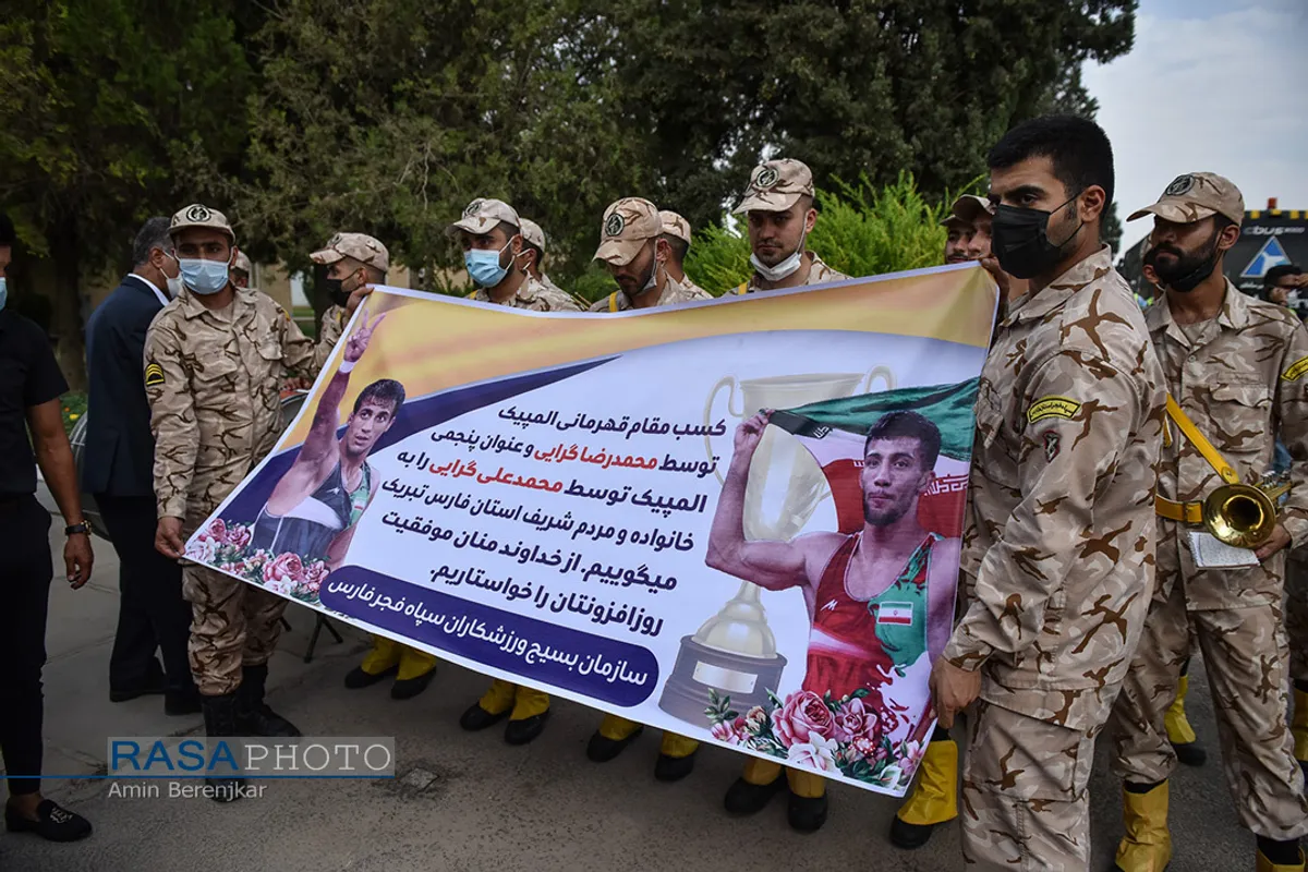 تجلیل نماینده ولی فقیه در استان فارس از قهرمان کشتی المپیک