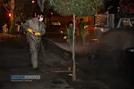 ضدعفونی معابر شهر قم توسط جوانان بسیجی و طلاب
